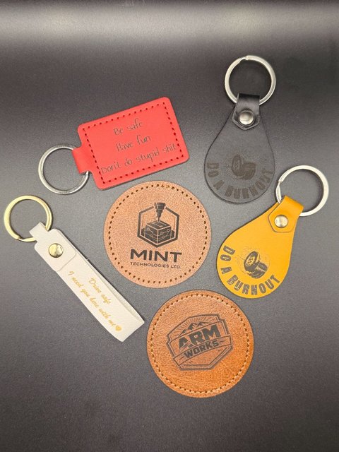 Custom laser engraved leather keychains and logo patches