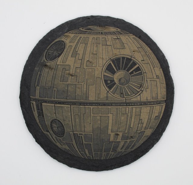 Black slate coaster with a detailed Death Star laser engraving